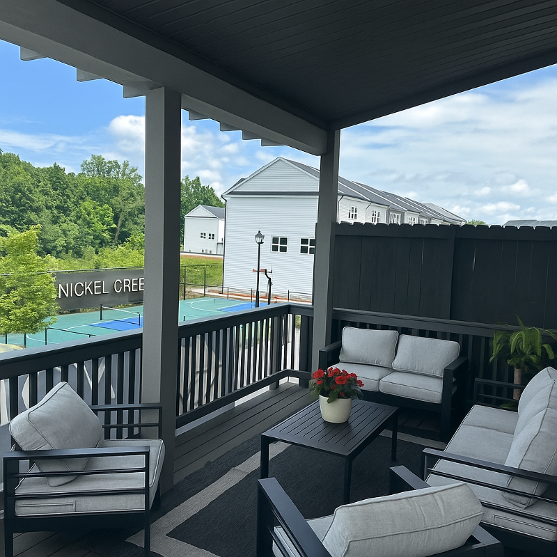 Modern Patio with Tennis Court View.png
